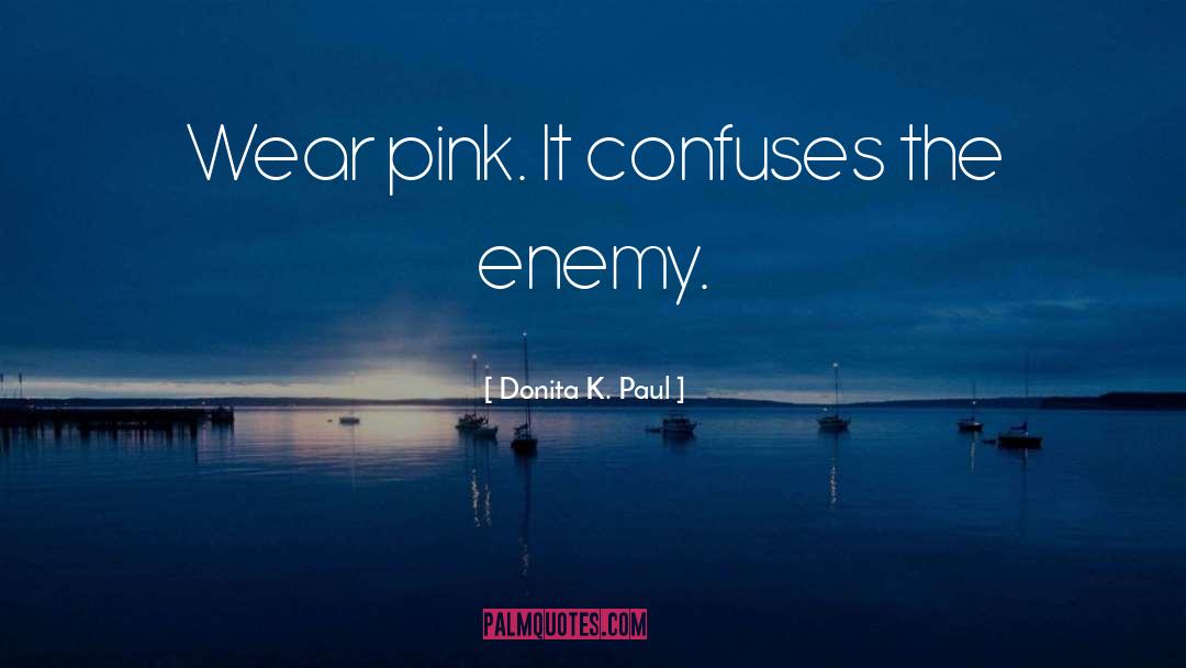 Donita K. Paul Quotes: Wear pink. It confuses the