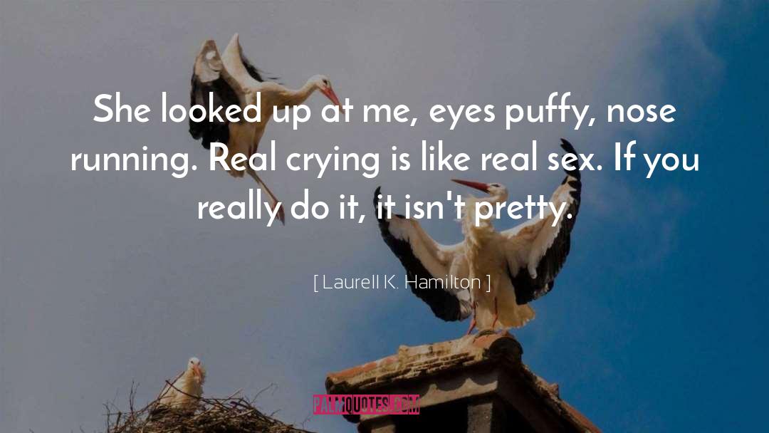 Laurell K. Hamilton Quotes: She looked up at me,