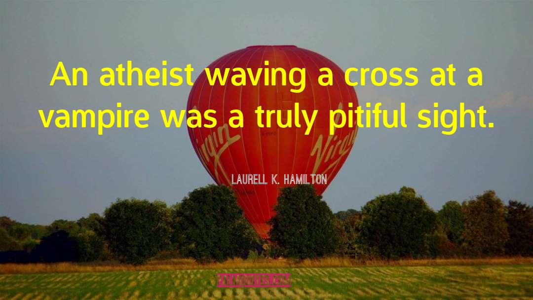 Top Atheist quotes by Laurell K. Hamilton